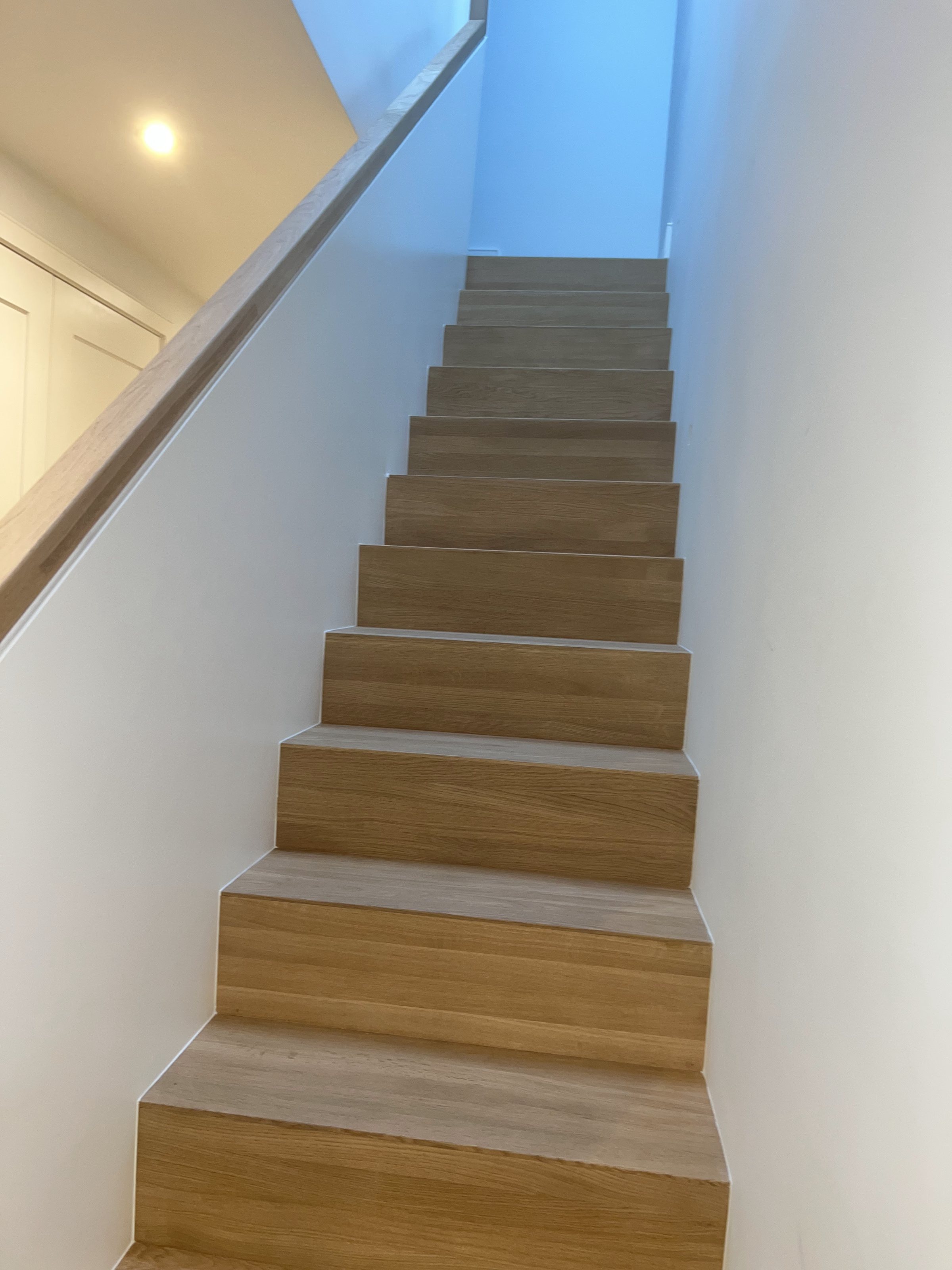 Staircase rebuilt with oak treads and painted risers